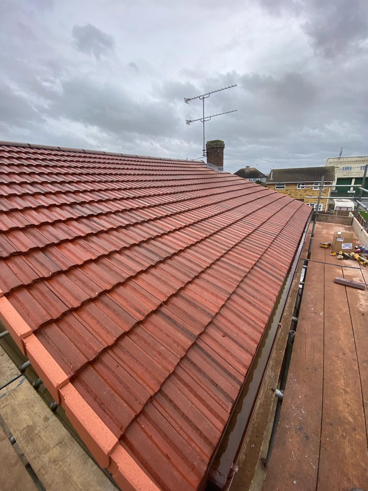 Completed red tiled re-roof by Lowestoft Goldway Roofing